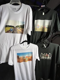 four t - shirts with different pictures on them